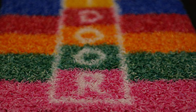 Artificial grass with corporate LOGOS